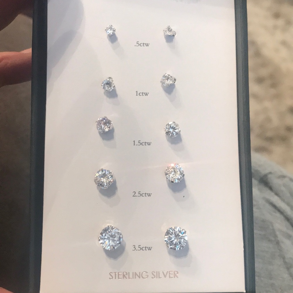 5 pair of sterling silver crystal earrings.